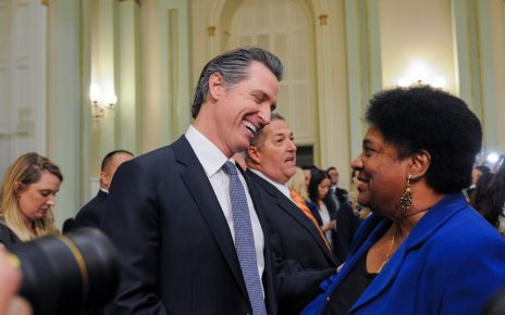 Gavin Newsom shares a laugh with Shirley Webar